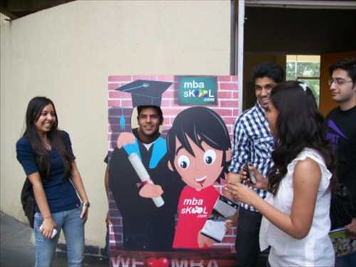 Students with the MBASkool standee